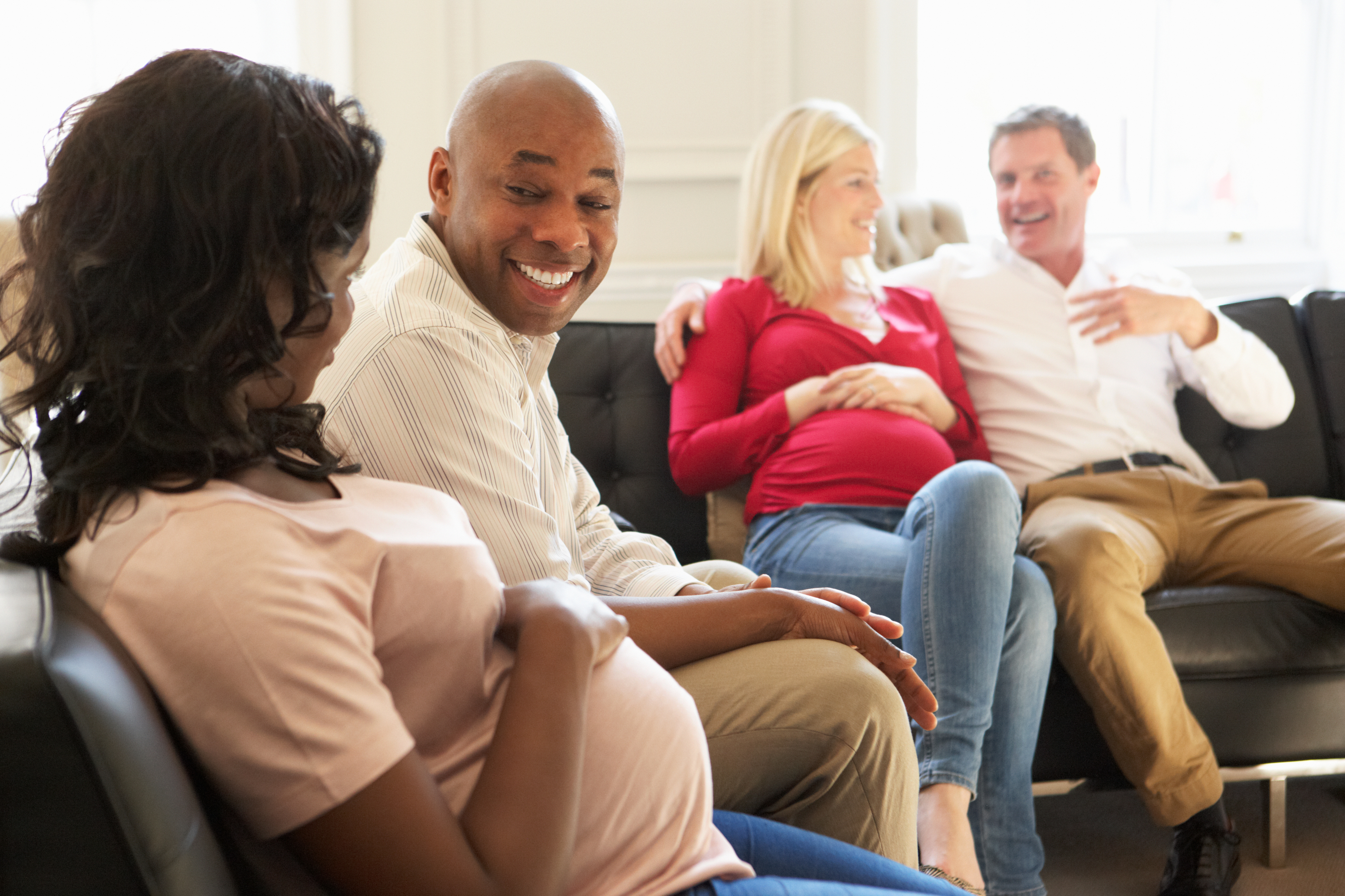 Couples sitting at a childbirth class